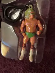 WWE ULTIMATE WARRIOR VARIANT HOLOGRAM Chibi In Motion Dangler Clip Keychain NEW