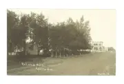 Roland Manitoba Pacific Ave Two men standing on wooden sidewalk b- Old Photo