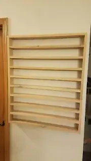 Custom hand made shelf that was made to display salt cellar collection.