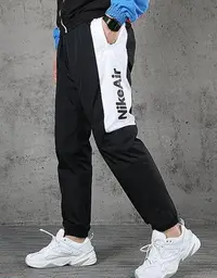 在飛比找Yahoo!奇摩拍賣優惠-【熱賣精選】NikeAir長褲運動梭織男款CK黑白側面字母防
