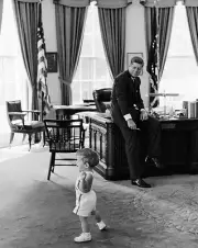 President John F. Kennedy watches JFK Jr. play in the Oval Office New 8x10 Photo