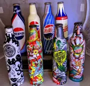 9 Unopened Aluminum 16oz Collectable Bottles. Pepsi And Mountain Dew. Very
