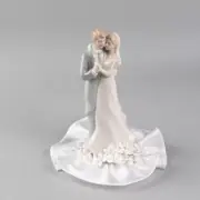 Pastel Dancing Couple Bride & Groom Cake Topper with Flowing Satin Base
