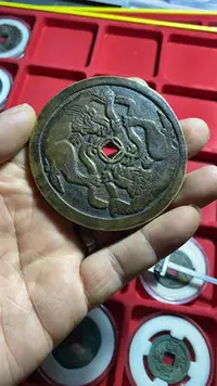 在飛比找Yahoo!奇摩拍賣優惠-真古錢幣 日本花錢獅子搶繡球。244