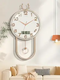 在飛比找樂天市場購物網優惠-輕奢高級感客廳掛鐘靜音石英鐘表現代創意搖擺壁掛時鐘藝術裝飾電