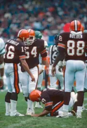 Kicker Matt Bahr Cleveland Browns looks for a spot to place the fo- Old Photo