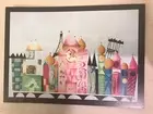 POSTCARD UNUSED DISNEY IT'S A SMALL WORLD FEATURS THE ICONIC SMILEY FACE CLOCK