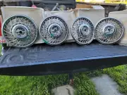 NOS GM Cadillac 14" Wire Spoke Hubcaps 1986 87 88 Deville Fleetwood Seville