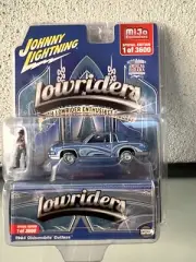 Johnny Lightning 1:64 Lowriders 1984 Oldsmobile Cutlass Blue with Figure