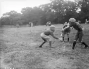 Boy Scout Old Photo - Two boy scouts enjoying a single stick fight at a scout ra