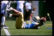 Running back Skip Hicks of UCLA celebrates after scoring a touchdo- Old Photo