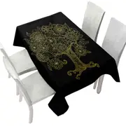 Golden Tree Drawing over Black Tablecloth