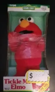 Sesame Street - The Original Tickle Me Elmo Plush Toy -