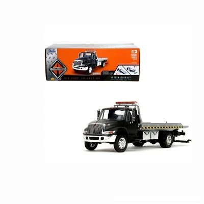 35851) Jada Toys. INTERNATIONAL FLATBED Tow Truck - BLACK COLOR. 1/24 SCALE.