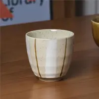 在飛比找ETMall東森購物網優惠-tatanara 日式茶杯復古手繪條紋米黃色 陶瓷湯吞無把手