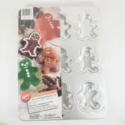 Wilton Bite Size Gingerbread Boy Pan 9 Molds Baking Bakeware Cake Pans Holiday