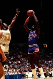 Truck Robinson of the Phoenix Suns shoots1980's Basketball Photo