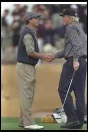 Scott Hoch and Greg Norman shake hands at the Andersen Consulting - Old Photo