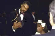 Philadelphia 76ers Julius Erving in tuxedo casual with daughter an- Old Photo