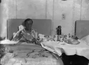 Mr J A Mollison enjoys breakfast bed after record breaking 11 000 - 1930s Photo