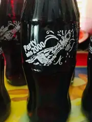 Party into 2000 ~ Collectable Coca cola bottle bottles