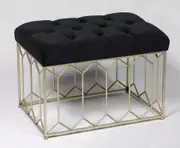 Gold metal stool with tufted velvet seating in black