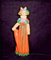 CERAMIC Rabbit Figurine Easter hat dress of carrots holding large carrot 9-1/2"