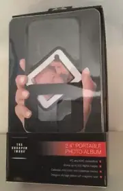2.4" Portable photo album by The Sharper Image up to 200 images great gift