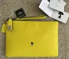 NWT COACH X SNOOPY LIMITED EDITION YELLOW TURNLOCK 26 WITH WOODSTOCK 64401