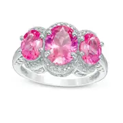 Oval Lab-Created Pink Sapphire and Diamond Accent Three Stone Frame Ring in Sterling Silver