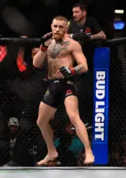 Conor McGregor warms up v Nate Diaz at UFC 196, 2016 7x5 Photo
