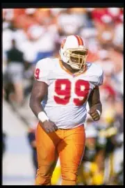 Defensive lineman Warren Sapp Tampa Bay Buccaneers looks on dur- 1996 Old Photo