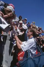 Swedish tennis player Stefan Edberg signing autographs for fans du- Old Photo