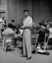 Singer Frank Sinatra singing as conductor Max Steiner begrudgi- 1940s Photo 1