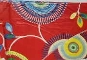 Superior Vinyl Flannel Back Tablecloth, 60" Round, COLORFUL FLOWERS ON RED