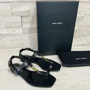 Saint Laurent Dwett Cassandra Black Leather Toe Loop Flat Sandals Size 36.5 NWT