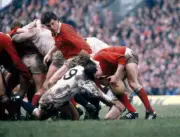 Steve Smith of England tackles Terry Holmes of Wales whilst his t - Old Photo