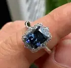 2Ct Emerald Cut lab-Created Blue Sapphire Engagement Ring 14K White Gold Plated