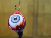 HALLOWEEN HORROR PROP Blue RIPPED OUT EYEBALL hooked Ornament Santa's Watching
