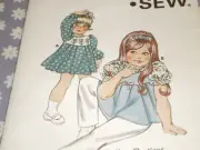 VTG KWIK SEW 1128 TODDLERS DRESS & SMOCK PATTERN--UNCUT-T1-T2-T3-T4