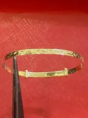 14kt Gold Baby bangle Bracelet 6 “ adjusteble 2 months to 3 years old