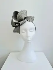 Miss Samantha. Womens loop headband fascinator in Light Grey