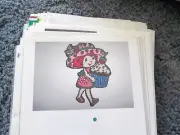GIRL WITH CUPCAKE WALL HANGING IN PLASTIC CANVAS