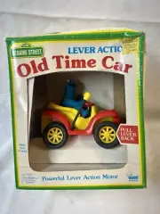 Vntg Sesame Street Lever Action Cookie Monster Old Time Car Red Yellow NIB NRFB*