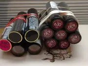 one tube of REVLON 630 RAISIN RAGE Lipstick CREME Original Formula