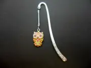 A TIBETAN SILVER BOOKMARK WITH A BROWN ENAMEL OWL CHARM. NEW.
