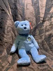Rare collectible ty beanie Babie Decade 2003 limited edition tag.