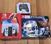 Nintendo switch oled with starlink and Zelda wire controller ( Brand New)