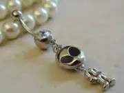 Alien Dangle With A Round Cubic Zirconia Navel/Belly Ring.