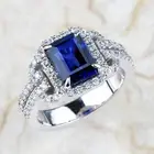 Lab Created Emerald Cut Blue Sapphire Halo Engagement Ring 14K White Gold Finish